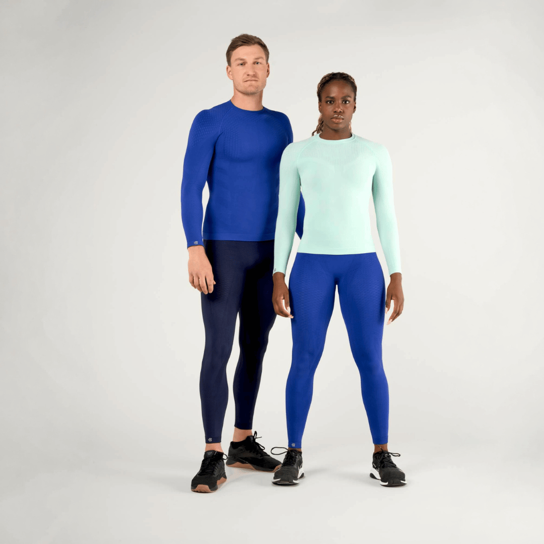 Two people wearing the bauerfeind's Sport compression wear collection on a white background
