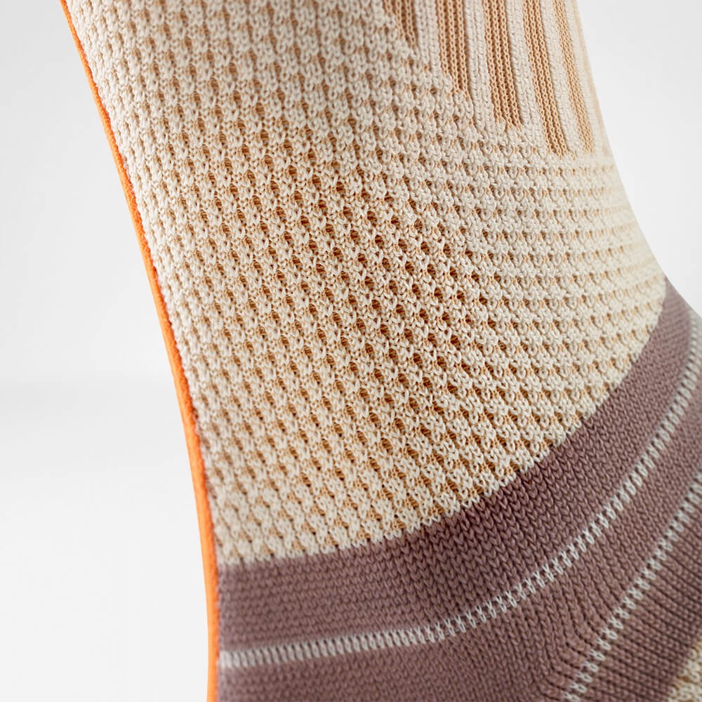 Close-up of a textured support with a patterned design on a light background