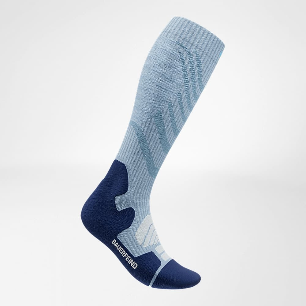 Knee-high sock with blue and gray pattern on a white background