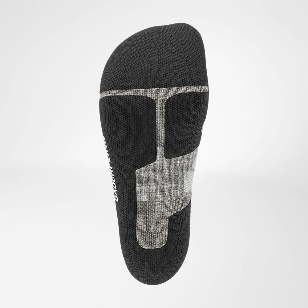 Black and gray ankle support brace on a white background