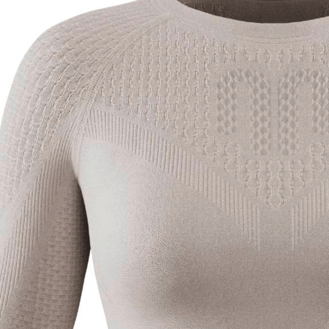 Close-up of the silver bauerfeind womens sport compression long sleeve shirt knit pattern