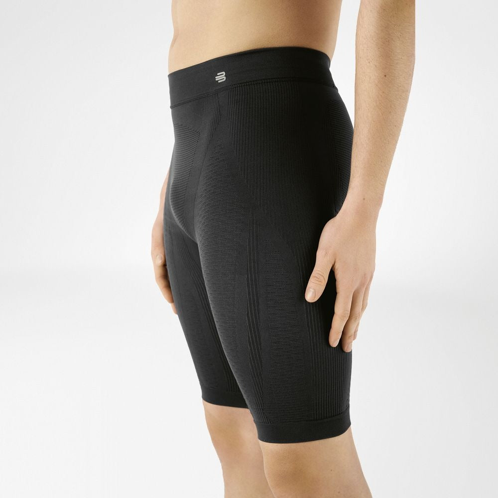 Grey Men's Bauerfeind Sport compression shorts worn by a person on a white background