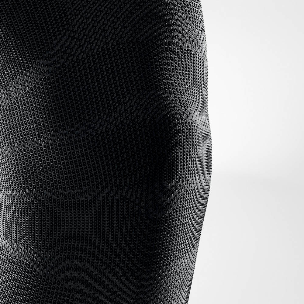 Closeup of the knee on a black bauerfeind Sports Compression Knee Support NBA